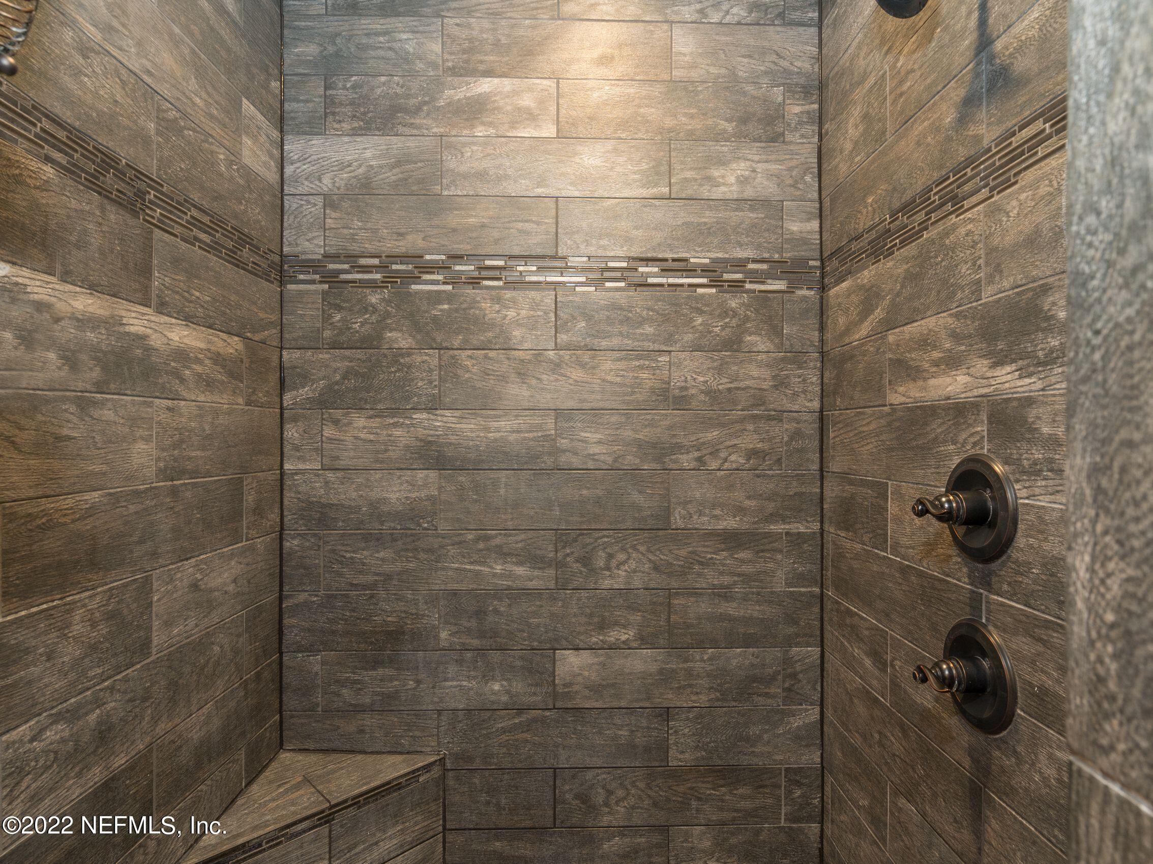 54476 Wildlife Way Callahan, FL 32011 - Photo 18 of 35 a bathroom with a shower