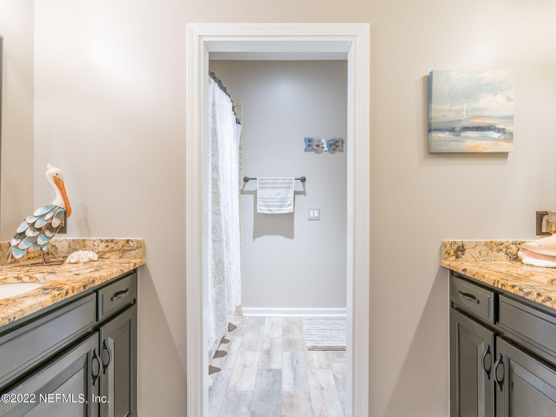 54476 Wildlife Way Callahan, FL 32011 - Photo 25 of 35 a view of bathroom with dual sinks