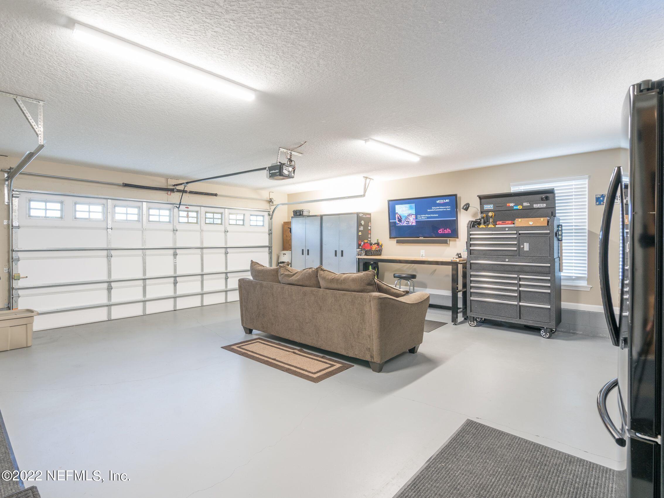 54476 Wildlife Way Callahan, FL 32011 - Photo 27 of 35 a living room with furniture and a window
