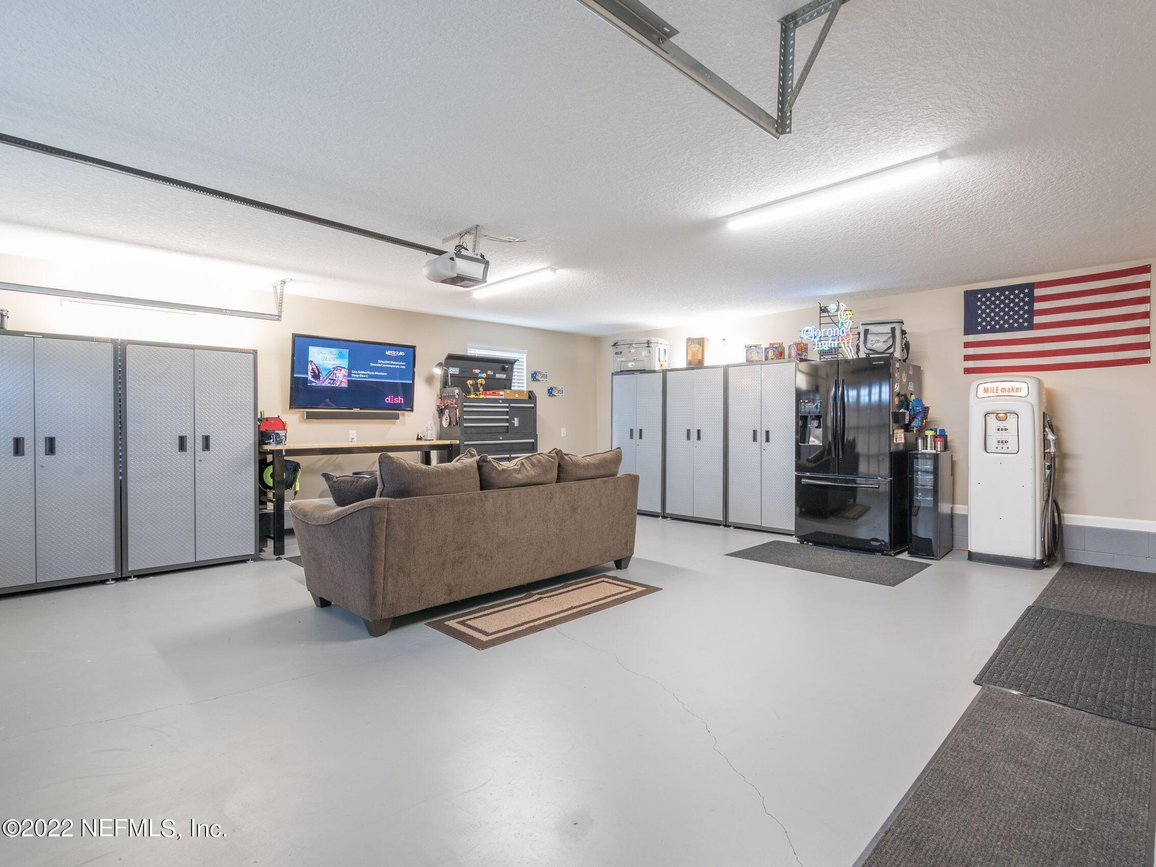 54476 Wildlife Way Callahan, FL 32011 - Photo 28 of 35 a living room with furniture and a ceiling fan