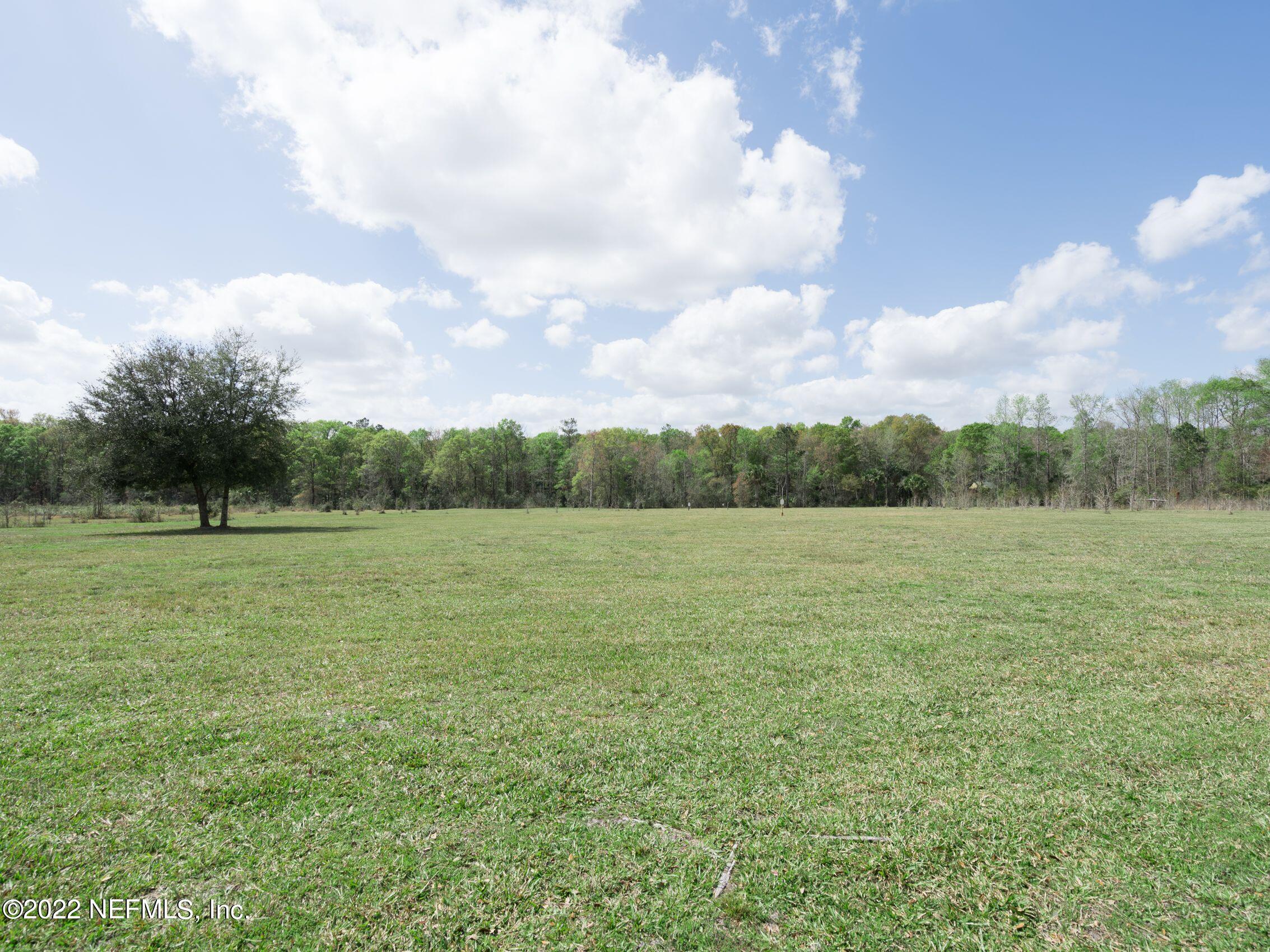 54476 Wildlife Way Callahan, FL 32011 - Photo 34 of 35 a view of outdoor space with green field and trees