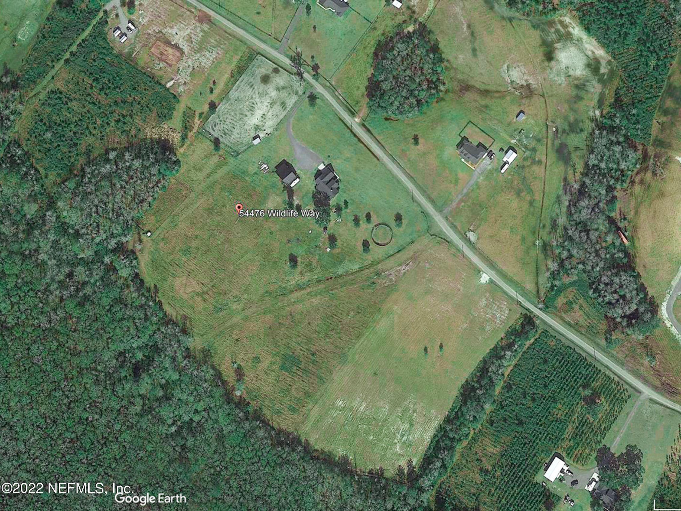 54476 Wildlife Way Callahan, FL 32011 - Photo 35 of 35 an aerial view of a residential houses with outdoor space