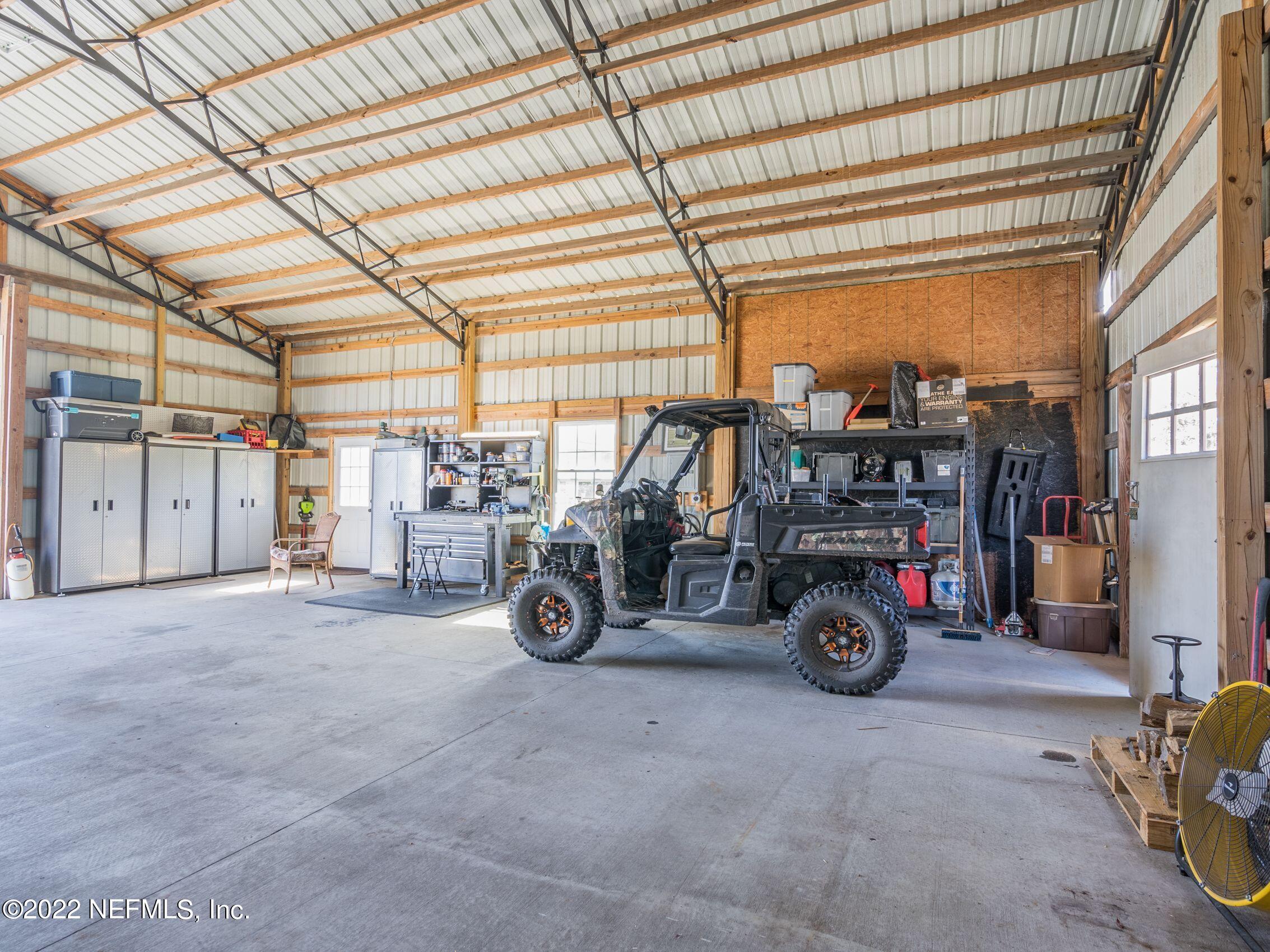 54476 Wildlife Way Callahan, FL 32011 - Photo 7 of 35 a view of a garage with storage