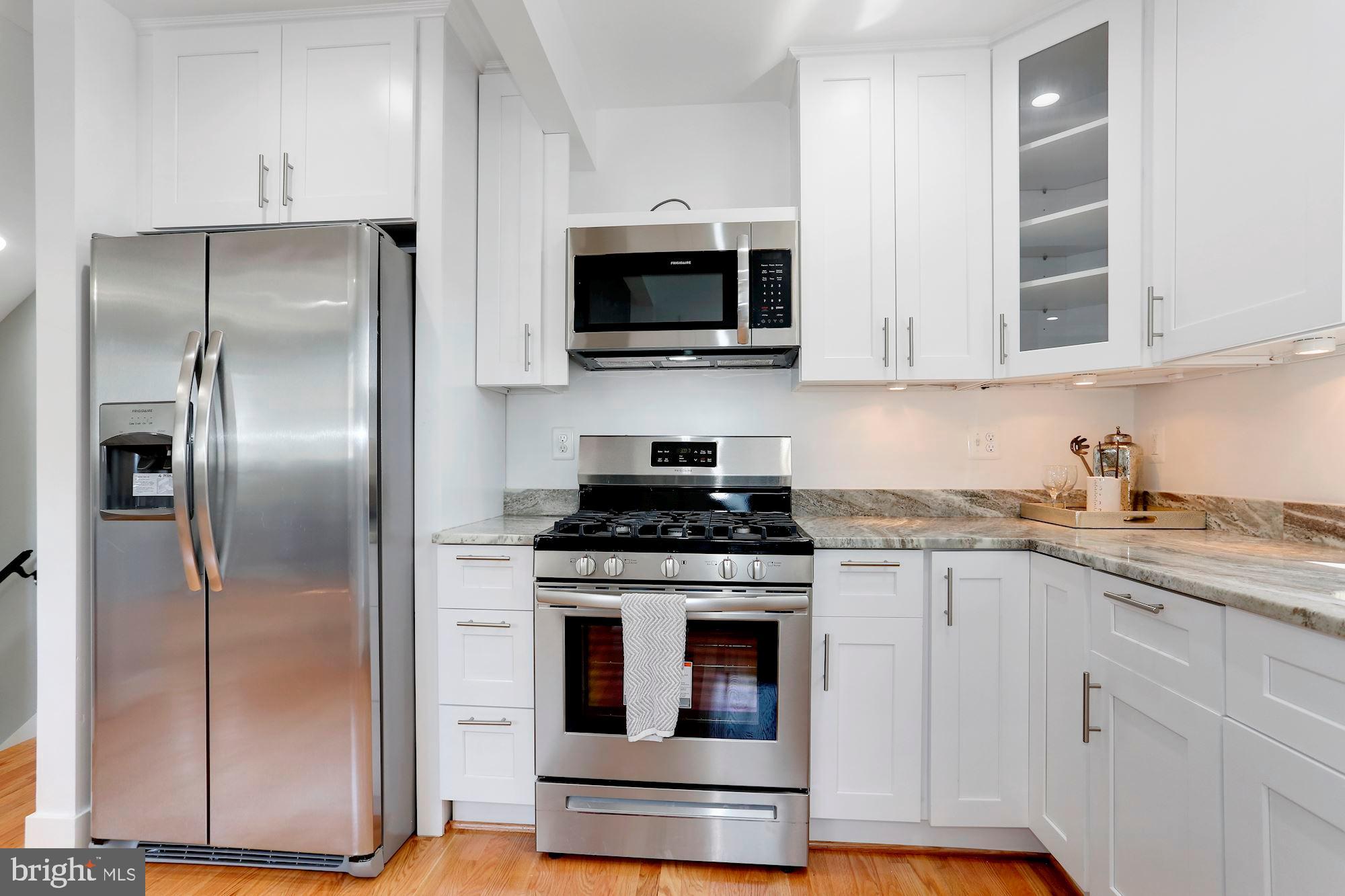 207 44th Street Northeast Washington, DC 20019 - Photo 13 of 32 Kitchen with Granite and Stainless