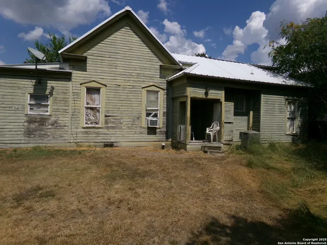 a front view of a house with glass windows