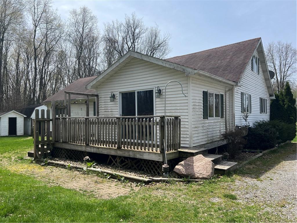 88 Fleming Road Grove City, PA 16127 - Photo 2 of 19 a view of a house with a yard and deck