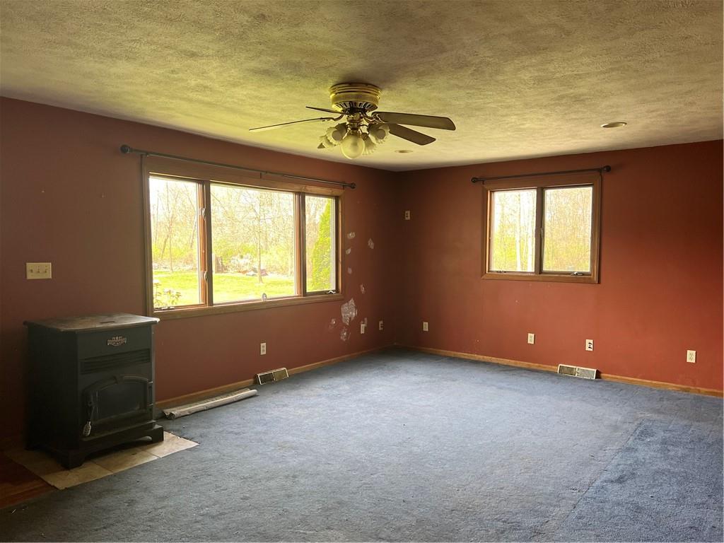 88 Fleming Road Grove City, PA 16127 - Photo 5 of 19 a view of an empty room with a window