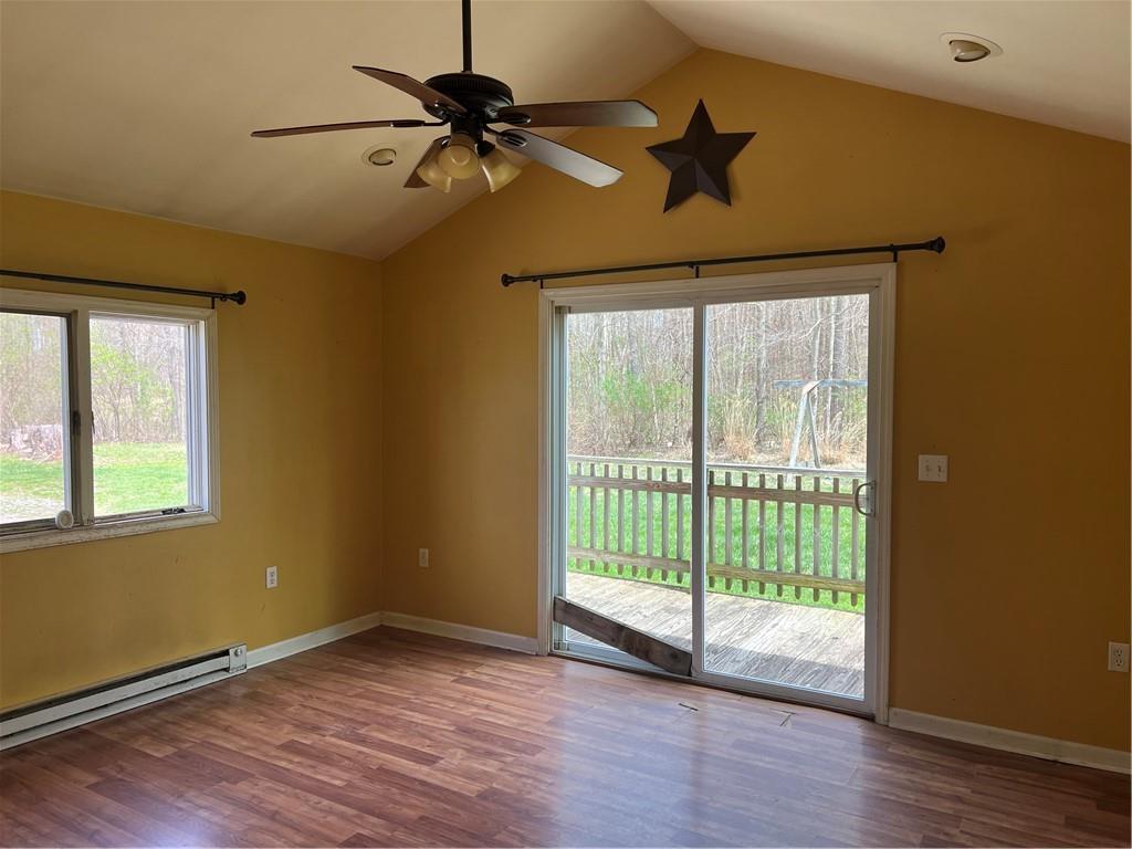88 Fleming Road Grove City, PA 16127 - Photo 7 of 19 a view of an empty room with wooden floor and a window