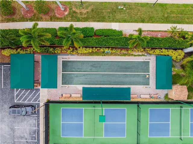 a view of a bench in front of a building