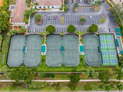 an aerial view of residential houses and outdoor space