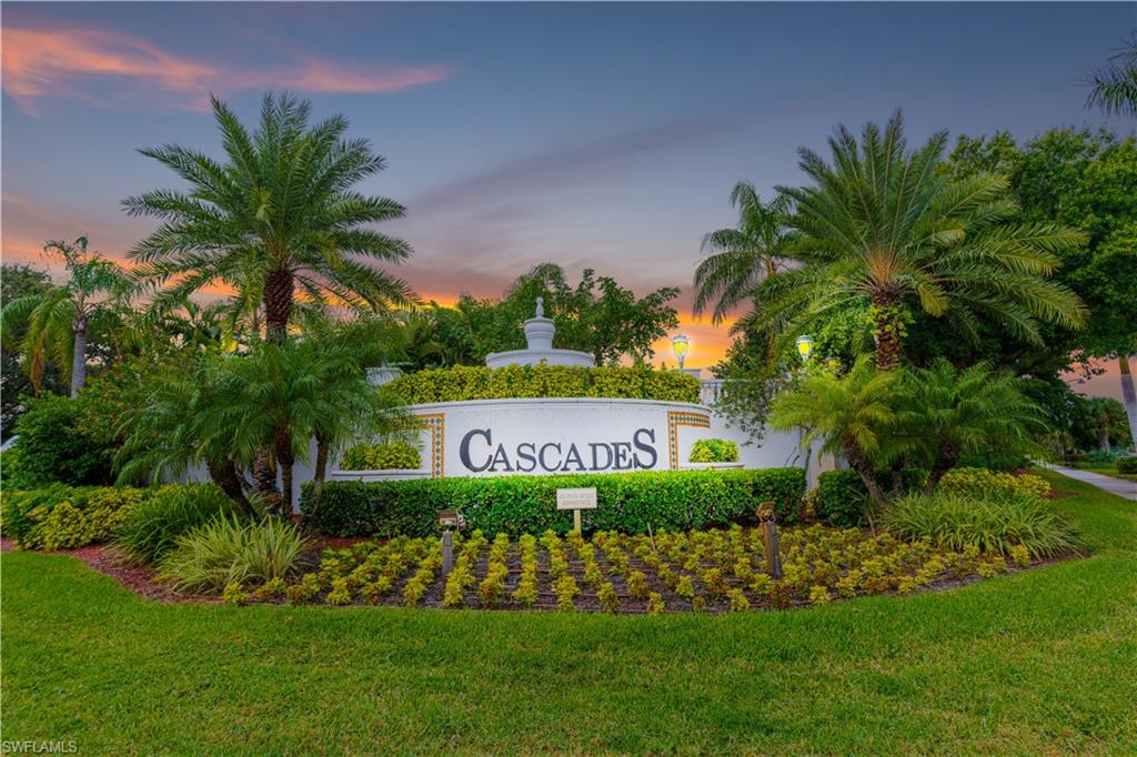 9348 Sun River Way Estero, FL 33928 - Photo 48 of 50 Community / neighborhood sign with a yard