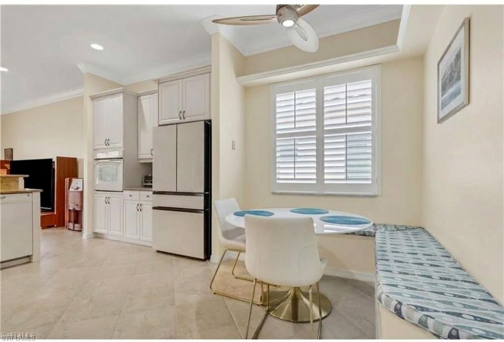 9348 Sun River Way Estero, FL 33928 - Photo 6 of 50 Dining area featuring ceiling fan, ornamental molding, recessed lighting, and breakfast area