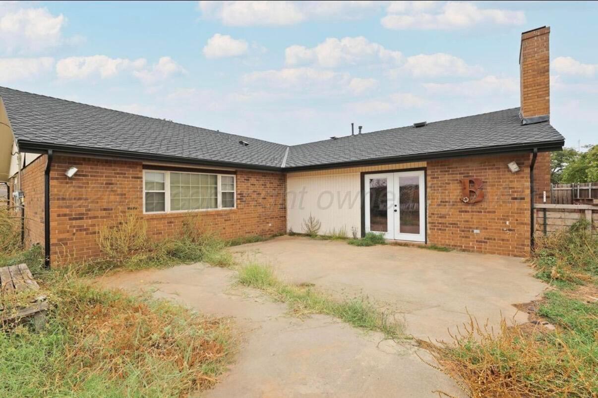 225 Bordeaux Lane Amarillo, TX 79119 - Photo 23 of 25 a front view of a house having yard