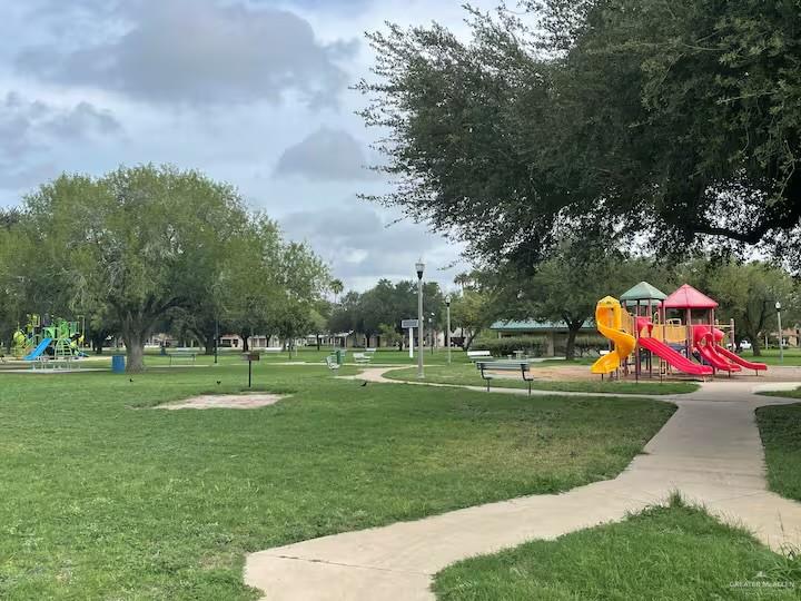 5100 North 16th Street McAllen, TX 78504 - Photo 12 of 14 a childrens park with lots of trees and slides