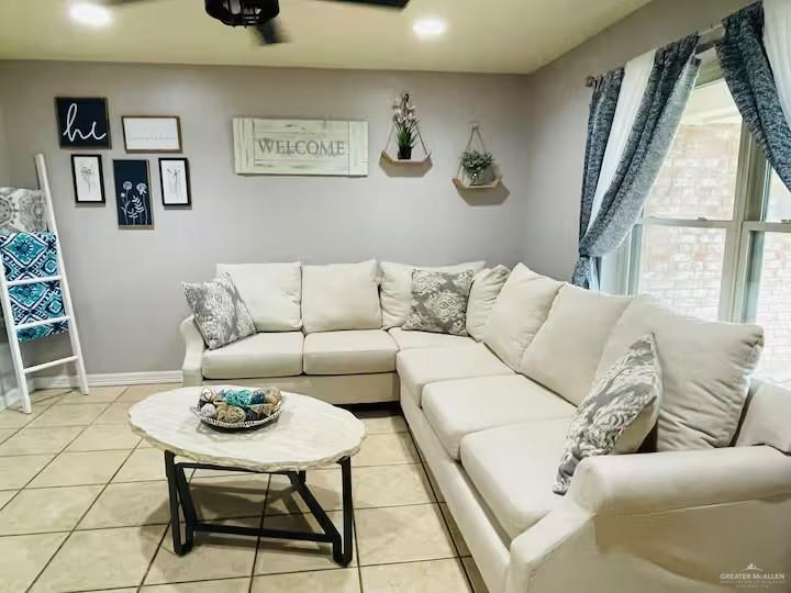 5100 North 16th Street McAllen, TX 78504 - Photo 2 of 14 a living room with furniture and a rug