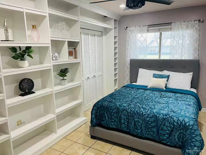 5100 North 16th Street McAllen, TX 78504 - Photo 6 of 14 a bedroom with a bed and a window