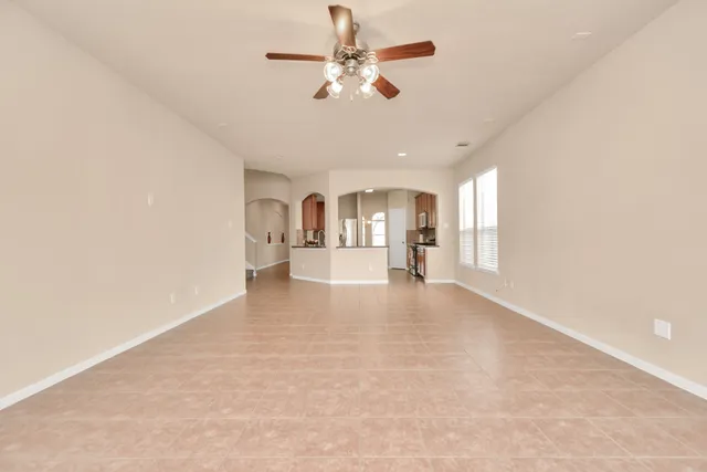 a bathroom with a tub sink and a mirror