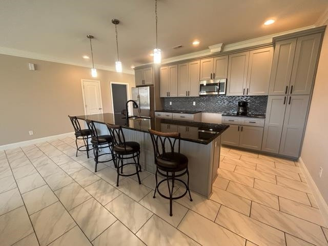 7071 Wheatfield Road Spring Hope, NC 27882 - Photo 8 of 30 a kitchen with stainless steel appliances granite countertop a sink a stove a chimney a refrigerator and cabinets