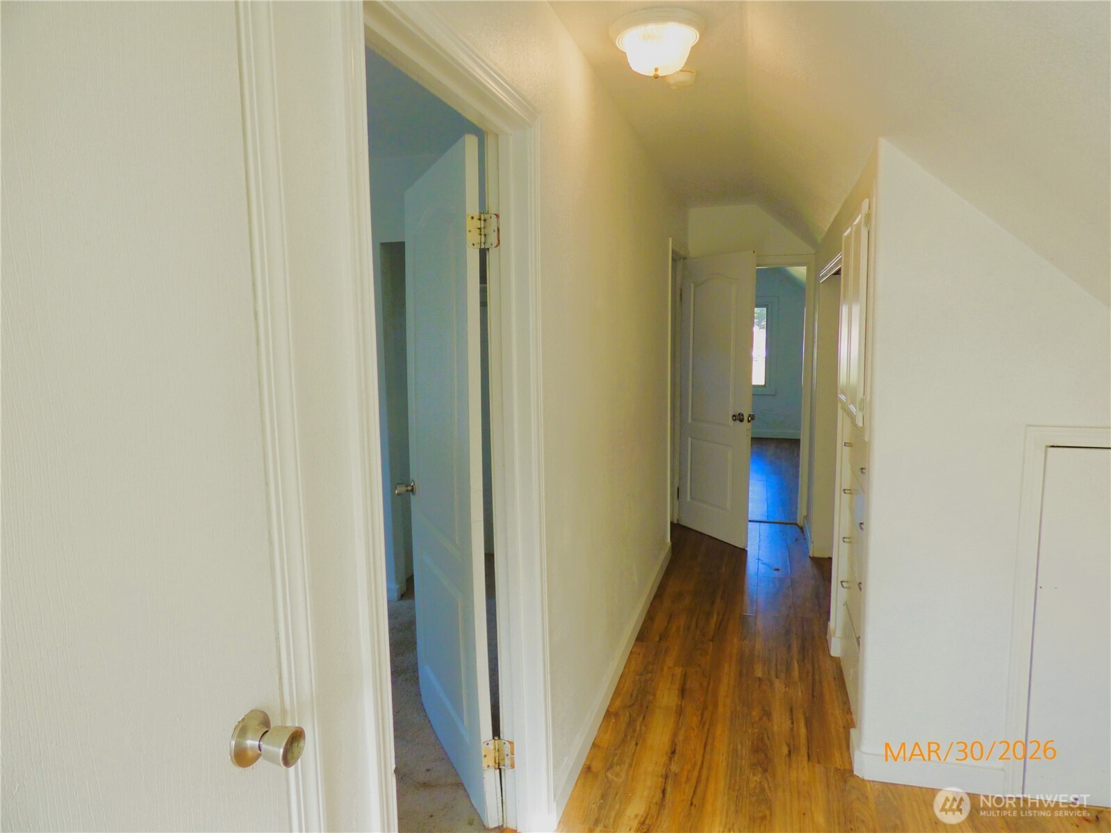 615 Haight Street Aberdeen, WA 98520 - Photo 12 of 18 a view of a hallway with wooden floor
