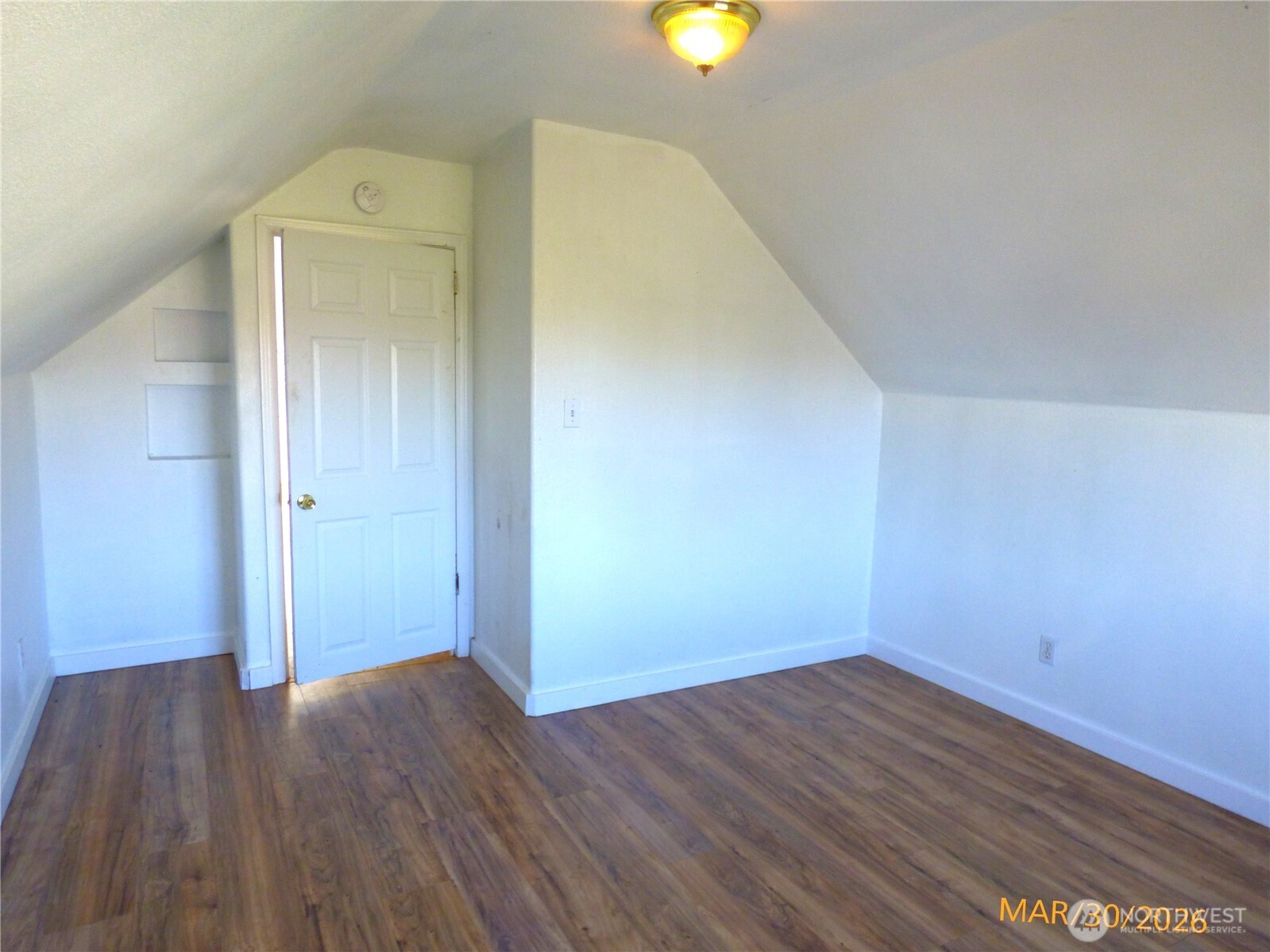 615 Haight Street Aberdeen, WA 98520 - Photo 16 of 18 an empty room with wooden floor and windows