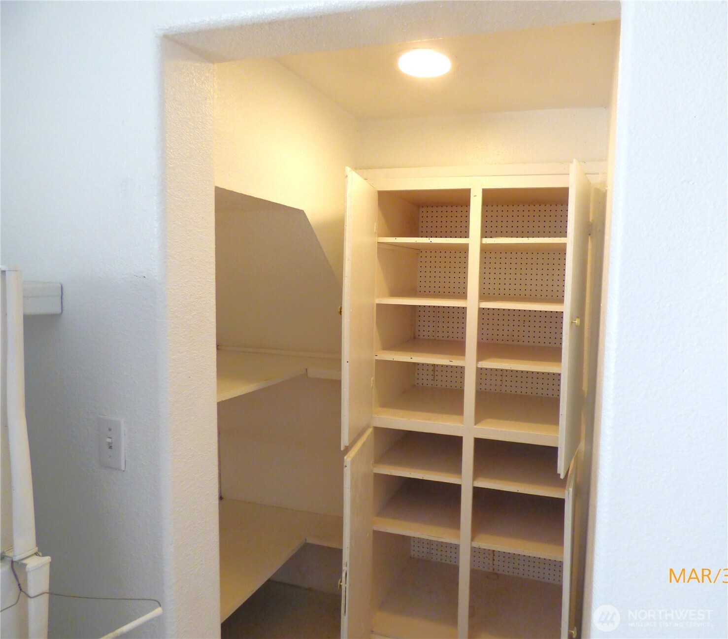 615 Haight Street Aberdeen, WA 98520 - Photo 7 of 18 a view of walk in closet with empty racks