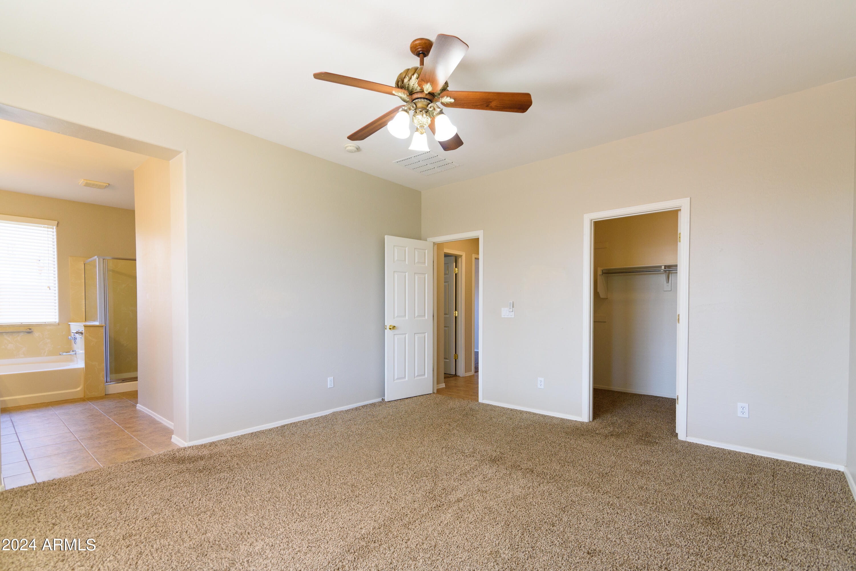 15467 West Redfield Road Surprise, AZ 85379 - Photo 19 of 28 19 Owners Bedroom