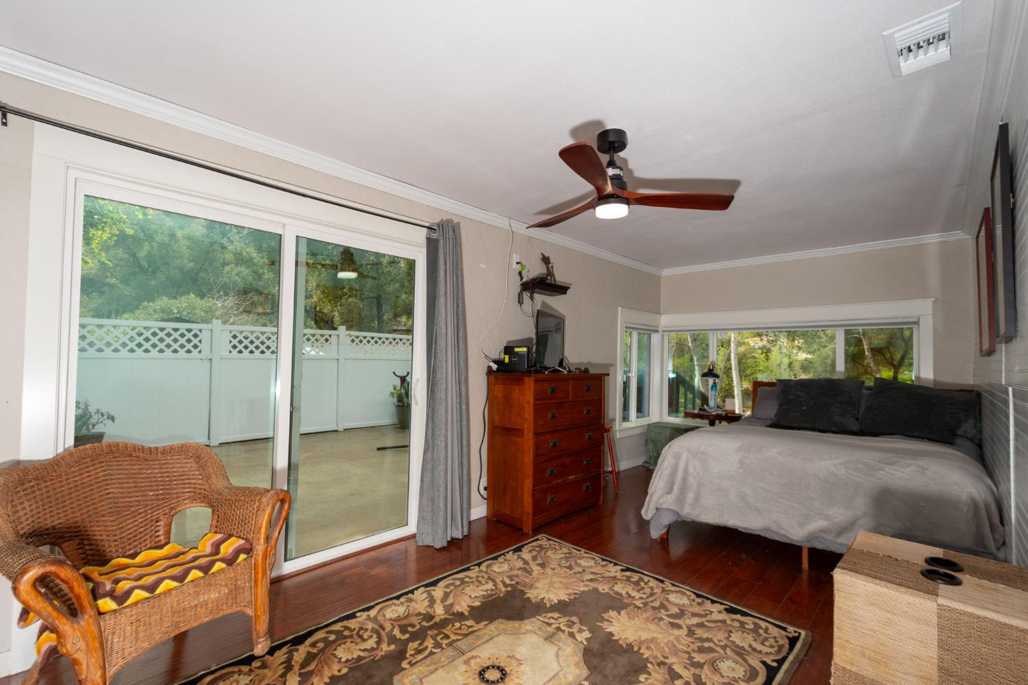 15663 Ojai Road Santa Paula, CA 93060 - Photo 13 of 47 a living room with a bed a couch and a window