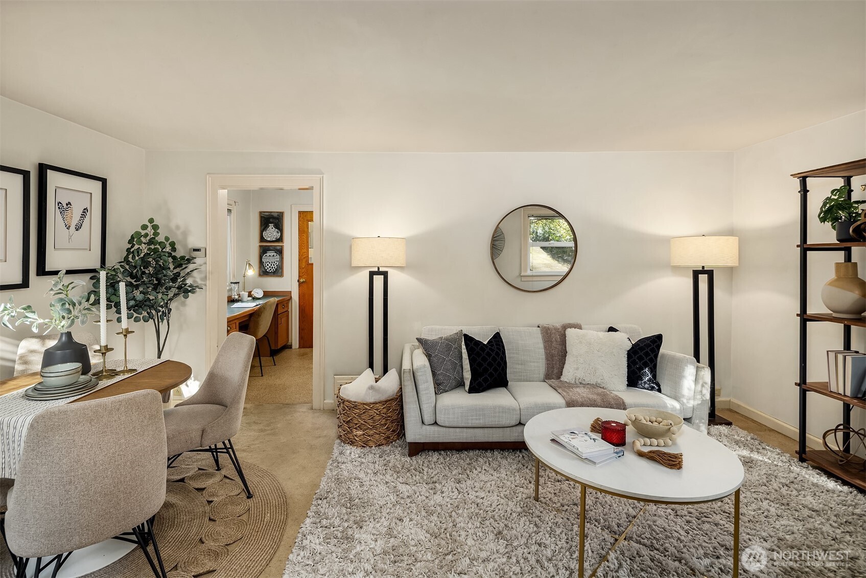 548 Northeast 102nd Street Seattle, WA 98125 - Photo 7 of 27 a living room with furniture a rug and a potted plant