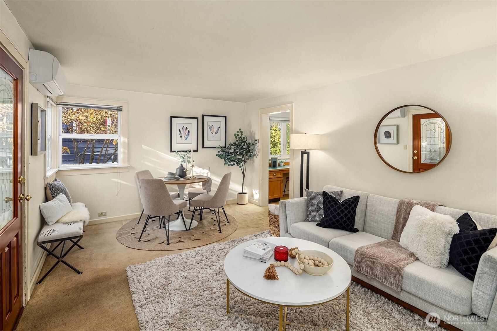 548 Northeast 102nd Street Seattle, WA 98125 - Photo 10 of 27 a living room with furniture and a large window