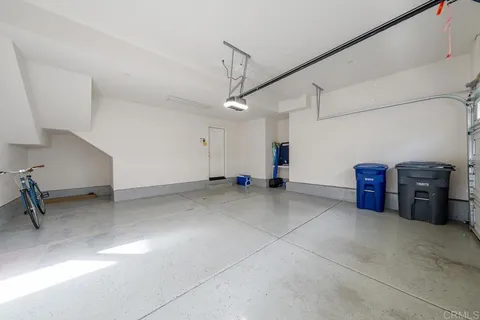 a view of a house with a yard patio and sitting area