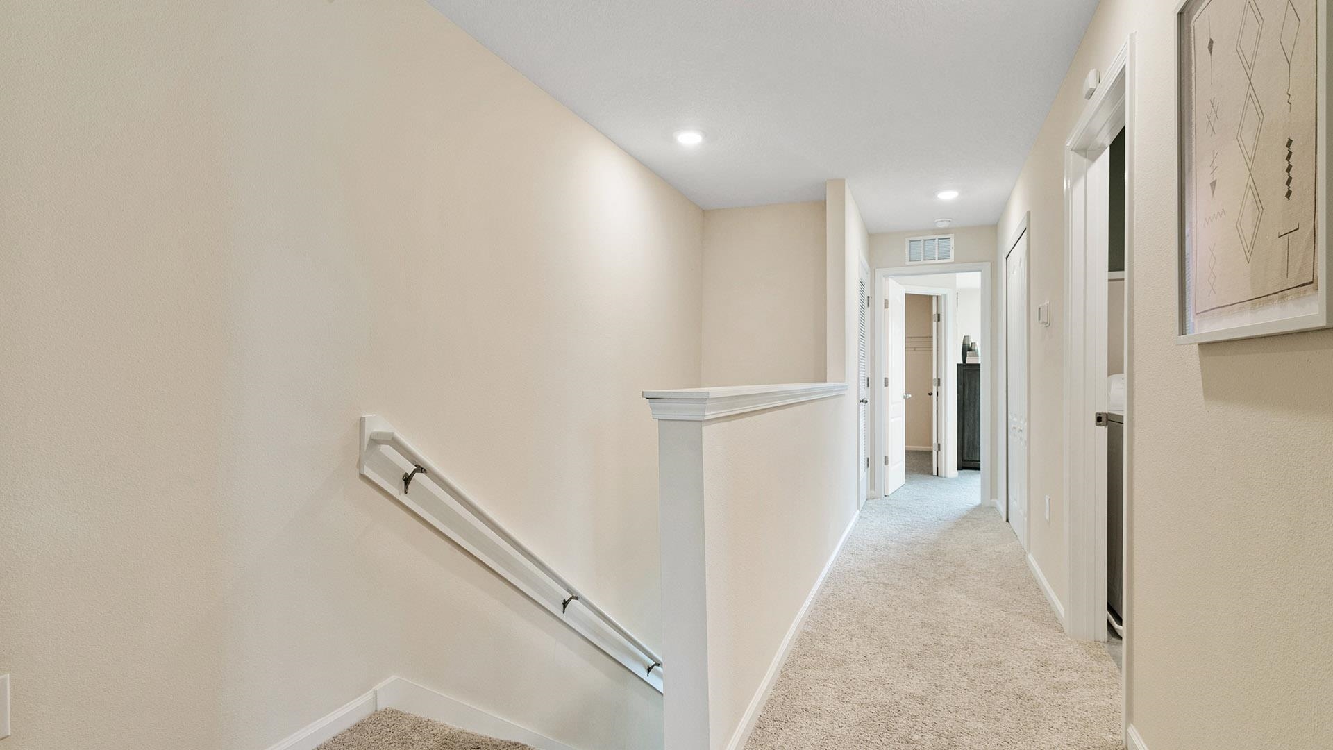 155 Redbud Road Palm Coast, FL 32137 - Photo 22 of 39 a view of a hallway with white walls