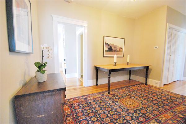 40 Parkton Road, Unit 2 Boston, MA 02130 - Photo 6 of 20 a workspace with furniture and wooden floor