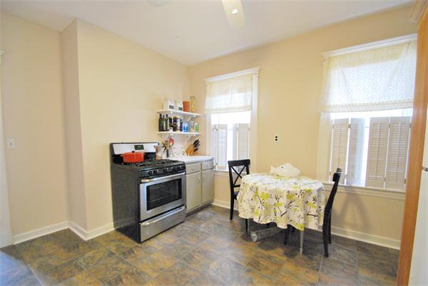 40 Parkton Road, Unit 2 Boston, MA 02130 - Photo 10 of 20 a kitchen with a stove and a refrigerator