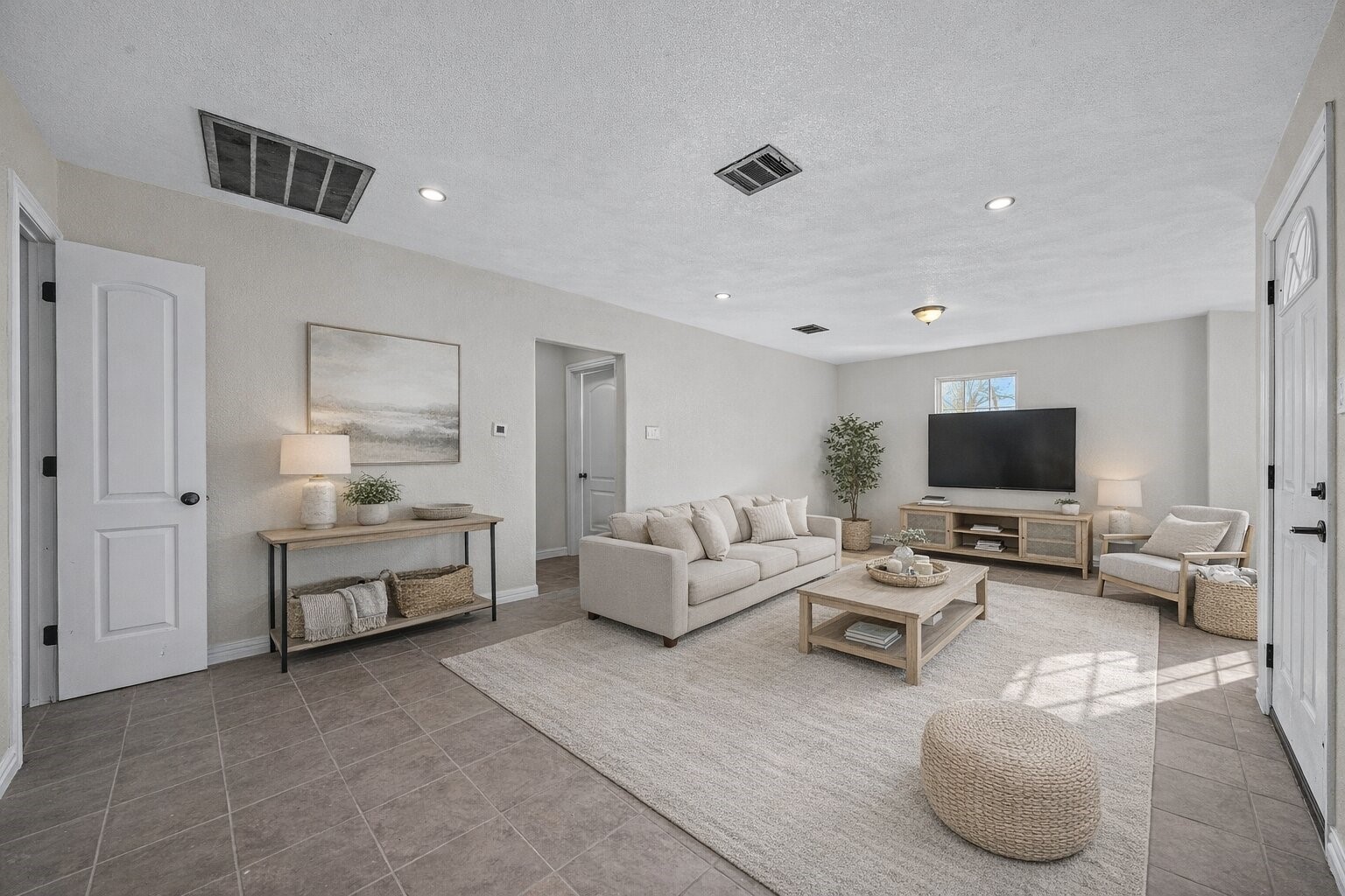 6911 Sherwood Drive Houston, TX 77021 - Photo 6 of 26 a living room with furniture and a flat screen tv