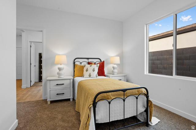 1624 South Staircase Way, Unit 4183 Washington, UT 84780 - Photo 25 of 47 Bedroom featuring neutral-toned carpeting and a double-pane window