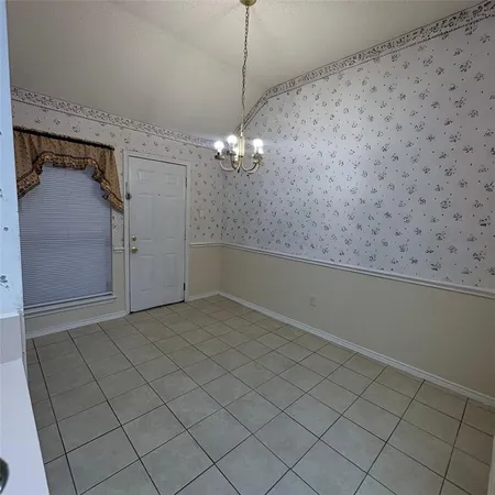 a view of a livingroom with chandelier