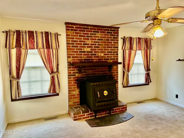 a living room with a fireplace