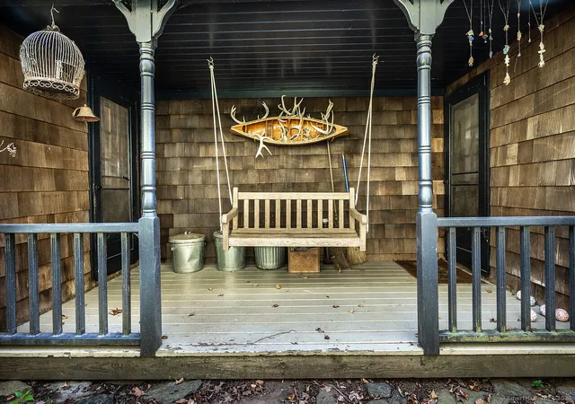 a view of a porch with a door