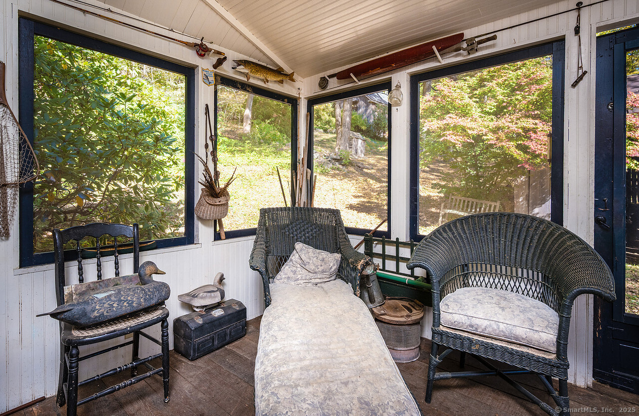 143 Whitcomb Hill Road Cornwall, CT 06754 - Photo 30 of 40 a living room with furniture and a large window