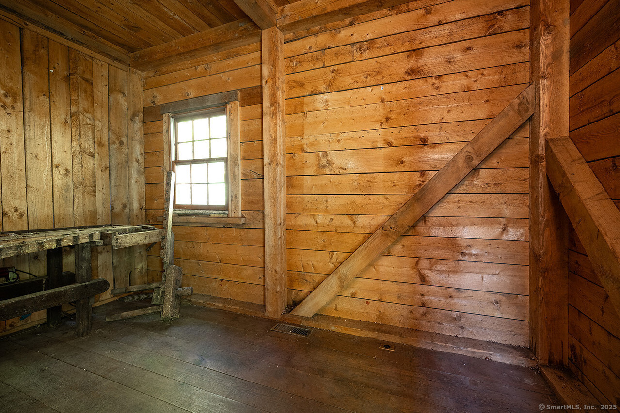 143 Whitcomb Hill Road Cornwall, CT 06754 - Photo 39 of 40 a view of an empty room with a window