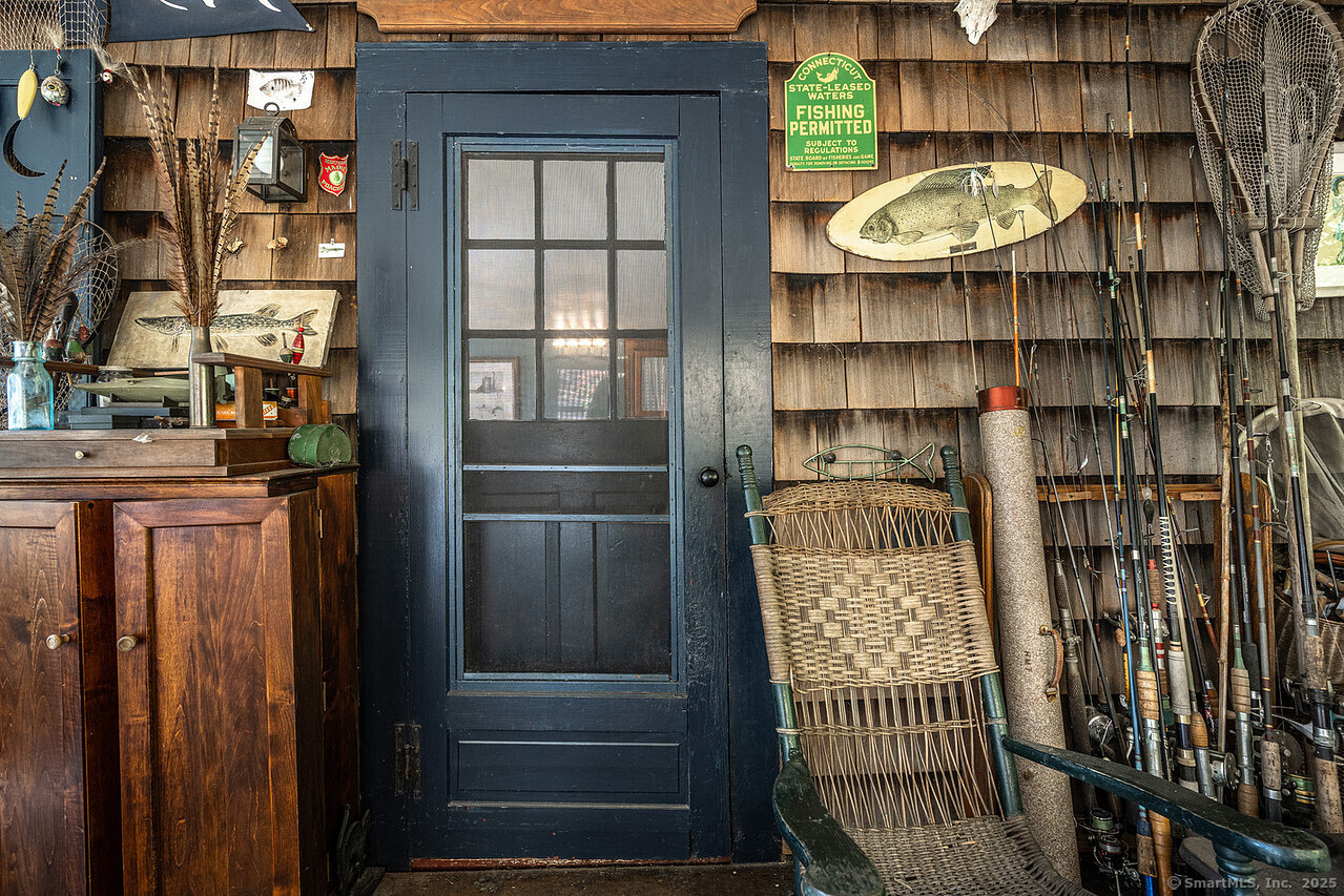 143 Whitcomb Hill Road Cornwall, CT 06754 - Photo 6 of 40 a view of a door and wooden floor in a balcony