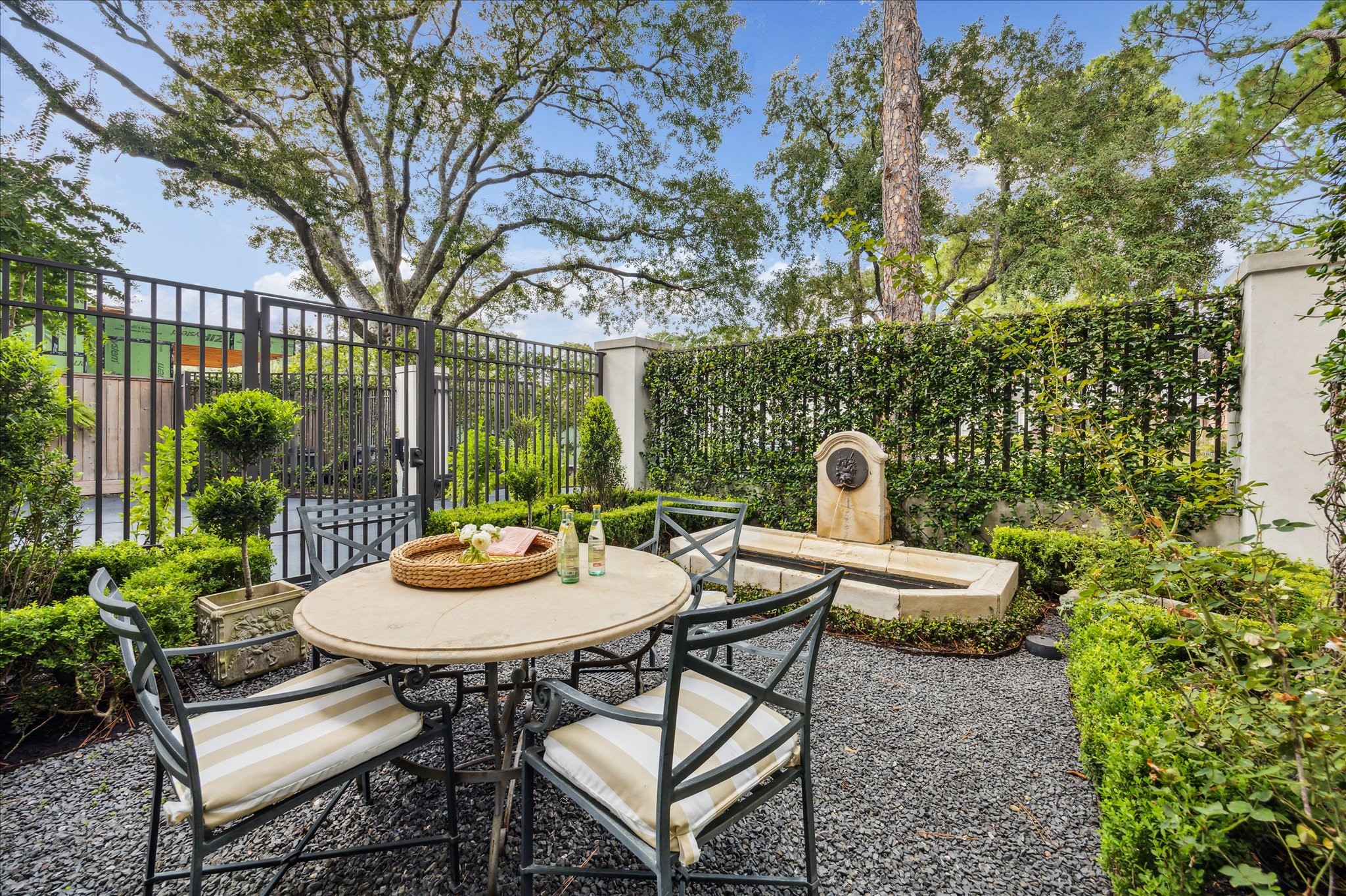 6107 Crab Orchard Road Houston, TX 77057 - Photo 18 of 42 a view of a backyard with furniture and garden