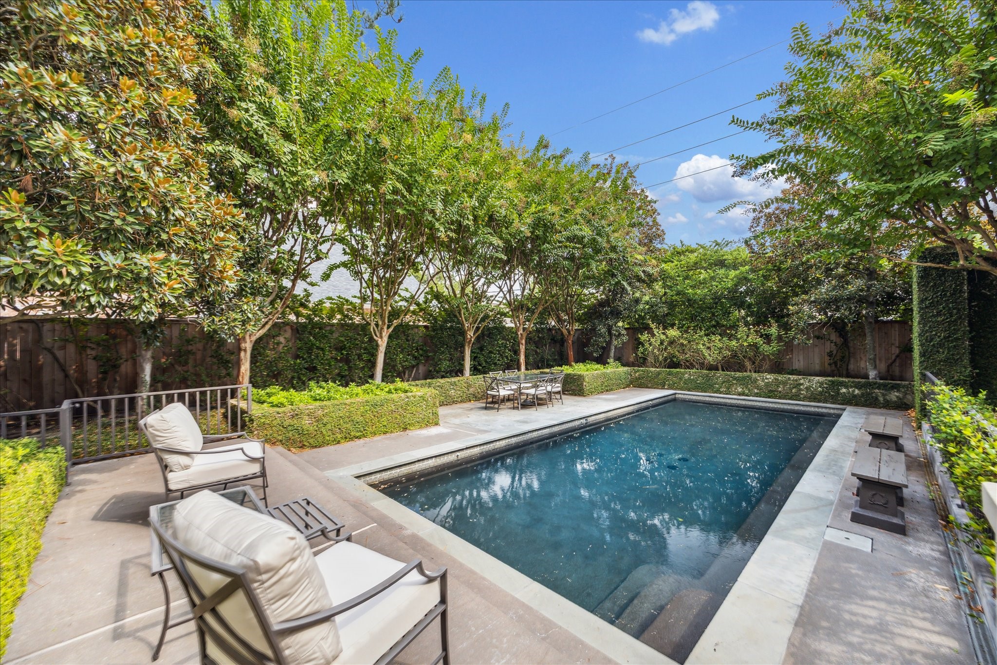 6107 Crab Orchard Road Houston, TX 77057 - Photo 42 of 42 a view of a swimming pool with a patio