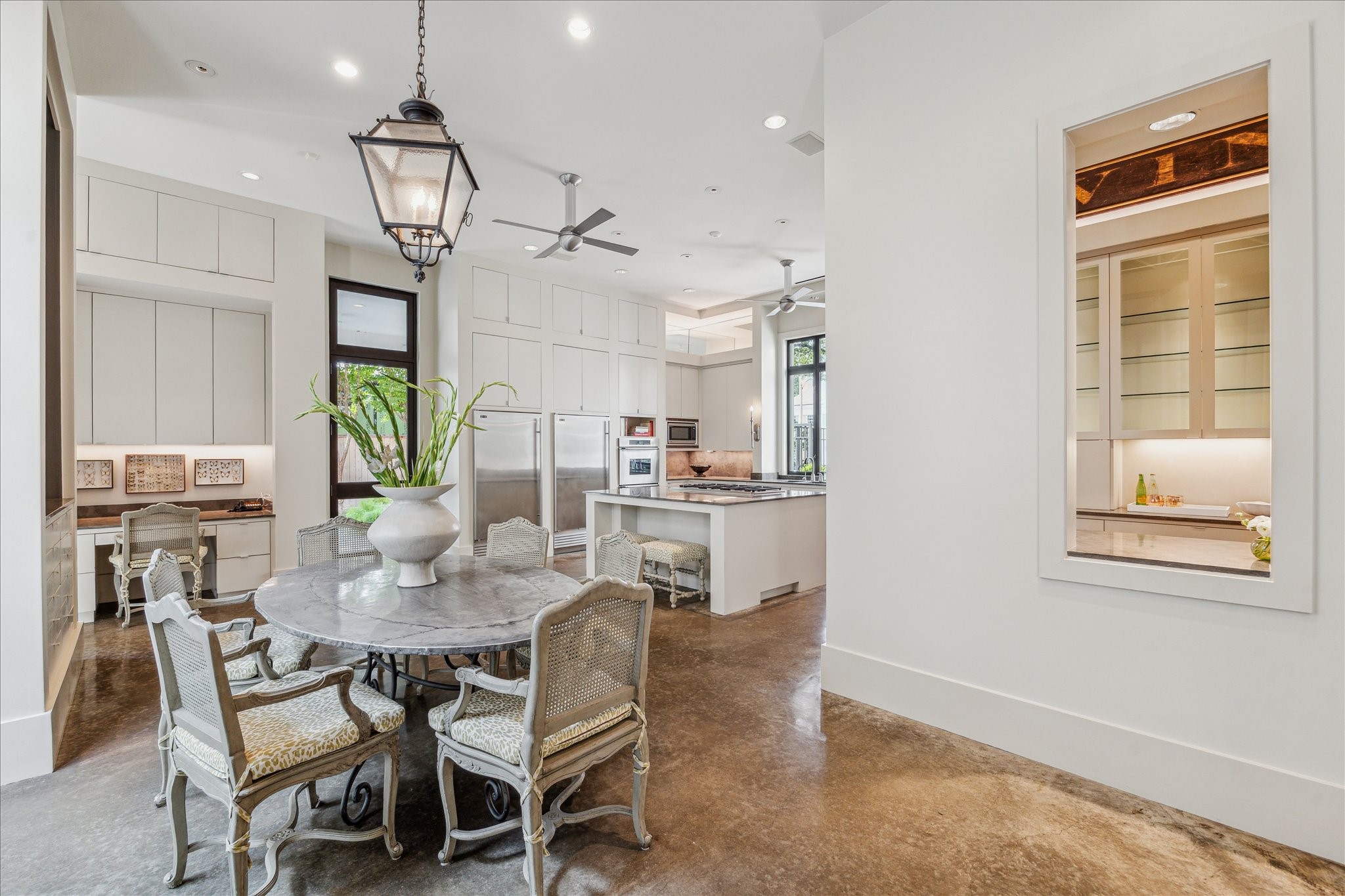 6107 Crab Orchard Road Houston, TX 77057 - Photo 7 of 42 a view of a dining room with furniture