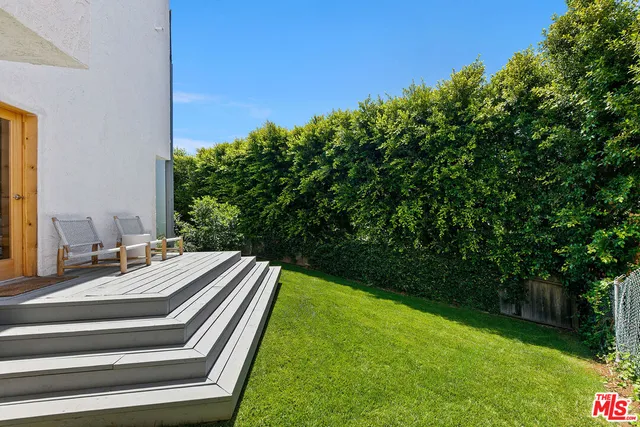 a room with furniture and a window