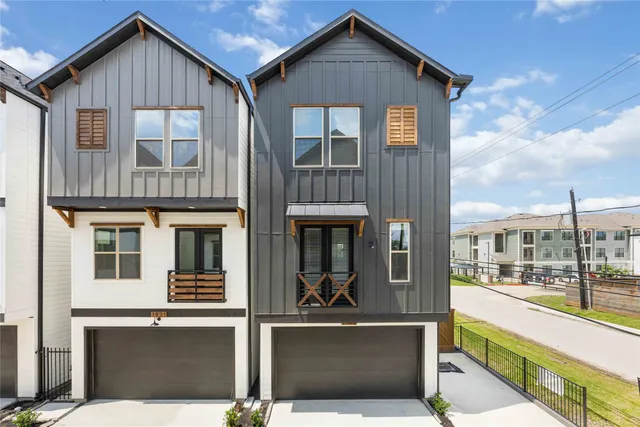 a front view of a house with glass windows