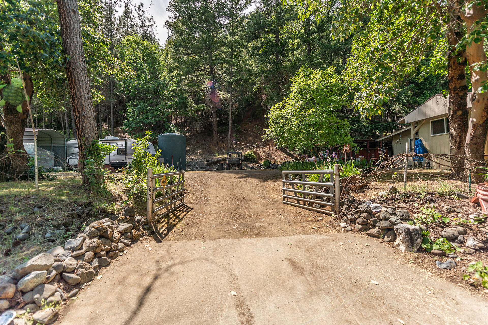 2940 Dutch Creek Road Junction City, CA 96048 - Photo 23 of 63 a view of backyard with wooden fence and a bench