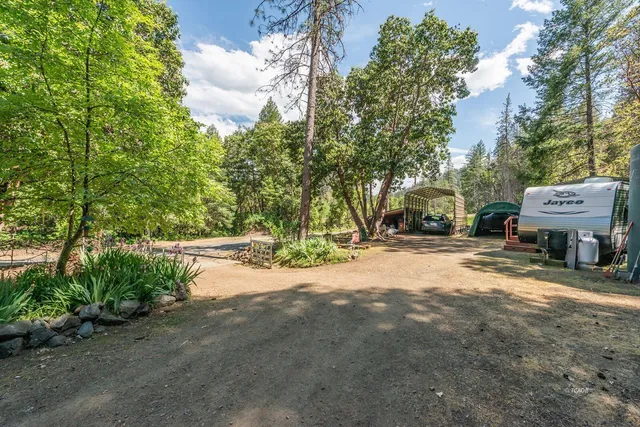 a view of backyard with green space