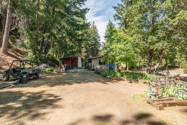 a view of a chairs in front of a house