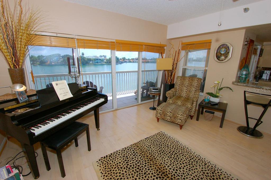 9357 Blind Pass Road, Unit 104 St. Pete Beach, FL 33706 - Photo 7 of 25 Amazing water views and living spaces